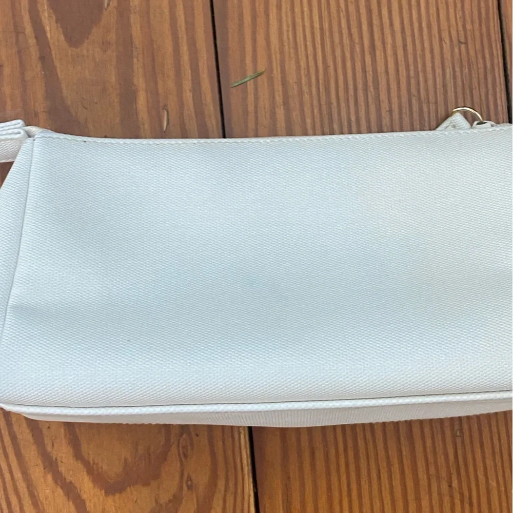 GUERLAIN Elegant Cream Cosmetic Bag with Blue Accents